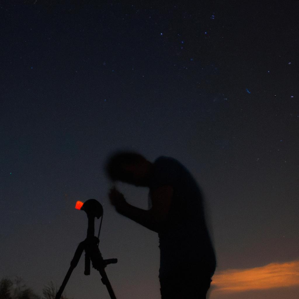 Person stargazing with camera