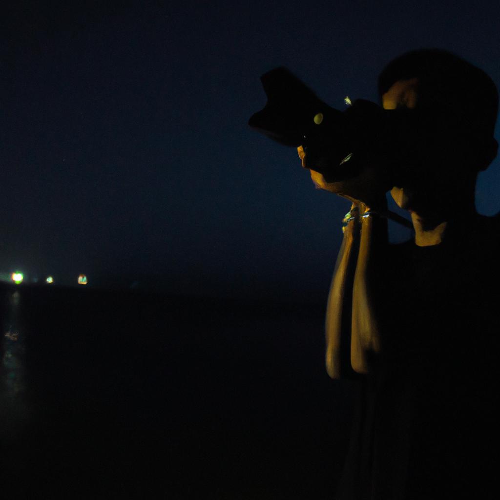 Person capturing night silhouette photographs