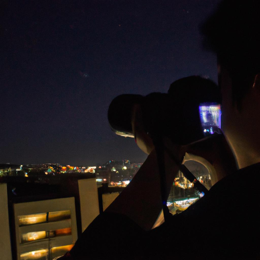 Person taking photos at night